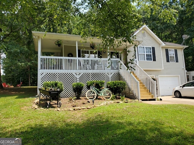 view of front of house with an attached garage, covered porch, concrete driveway, stairway, and a front lawn