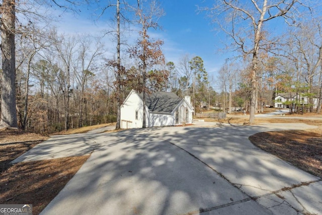 exterior space featuring driveway