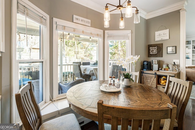 dining area featuring ornamental molding