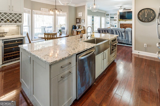 kitchen with wine cooler, dark wood finished floors, crown molding, stainless steel dishwasher, and a sink