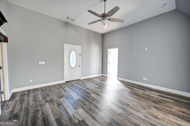 entryway featuring visible vents, lofted ceiling, dark wood finished floors, baseboards, and ceiling fan