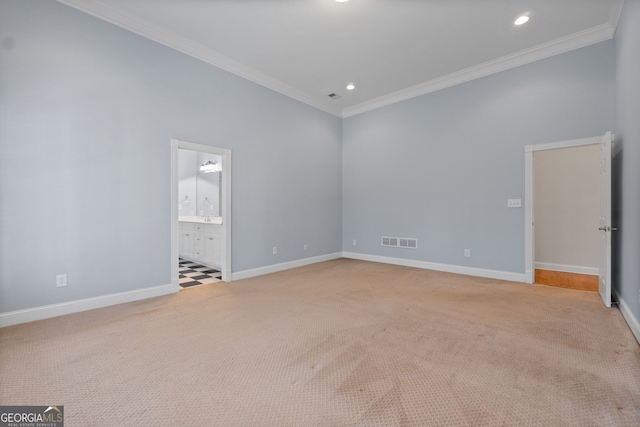 carpeted empty room featuring baseboards, recessed lighting, visible vents, and crown molding