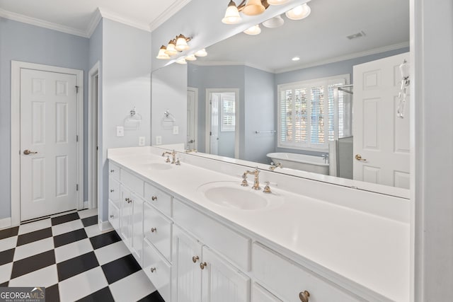 bathroom with crown molding, visible vents, a sink, and tile patterned floors