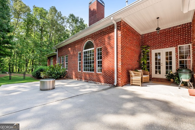 view of patio / terrace featuring french doors and area for grilling