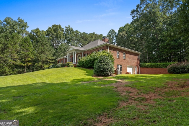 exterior space with driveway and an attached garage