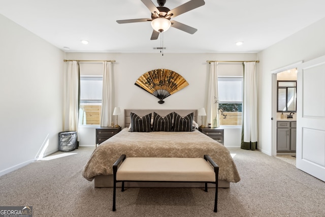 carpeted bedroom featuring visible vents, baseboards, a ceiling fan, and recessed lighting