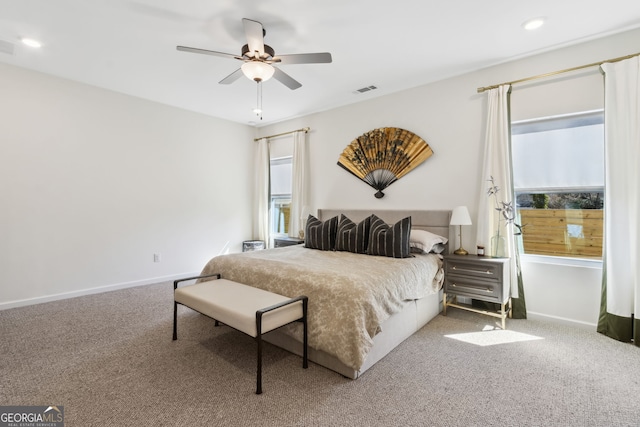 bedroom featuring recessed lighting, carpet flooring, visible vents, and baseboards