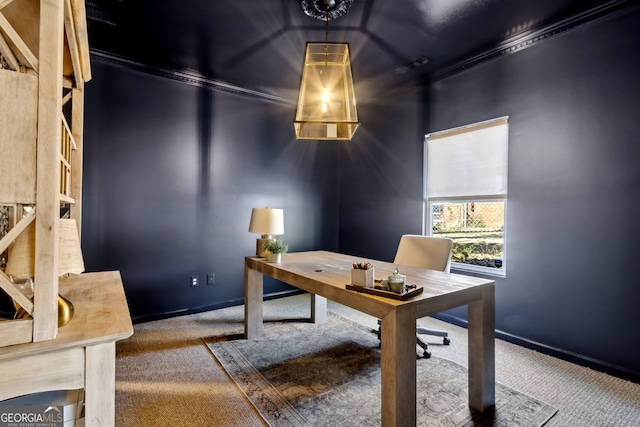 home office with carpet floors and baseboards