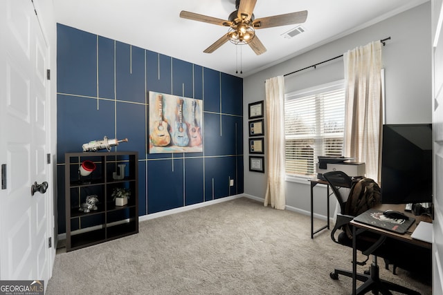 office featuring baseboards, ceiling fan, visible vents, and carpet flooring