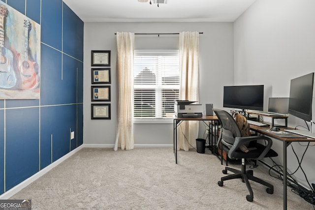 office area featuring carpet and baseboards