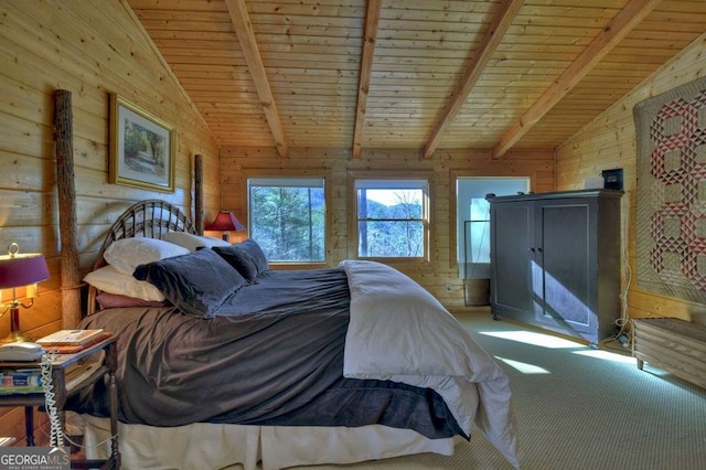 carpeted bedroom with lofted ceiling with beams, wooden ceiling, and wooden walls
