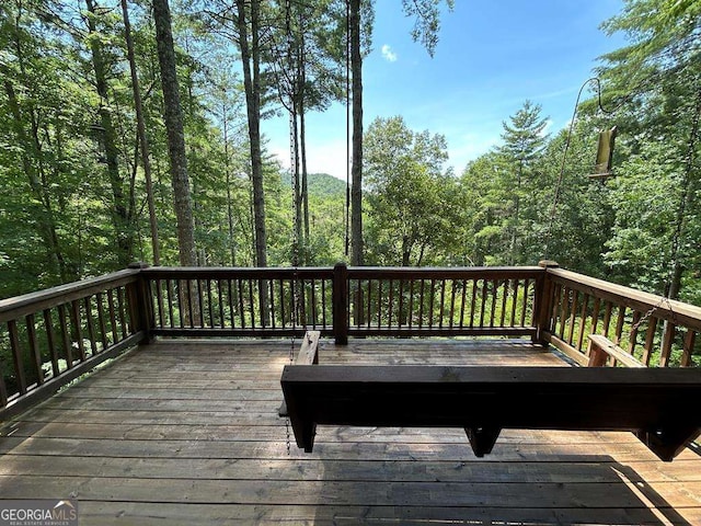 deck with a view of trees