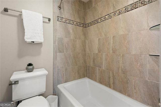 full bathroom featuring  shower combination and toilet