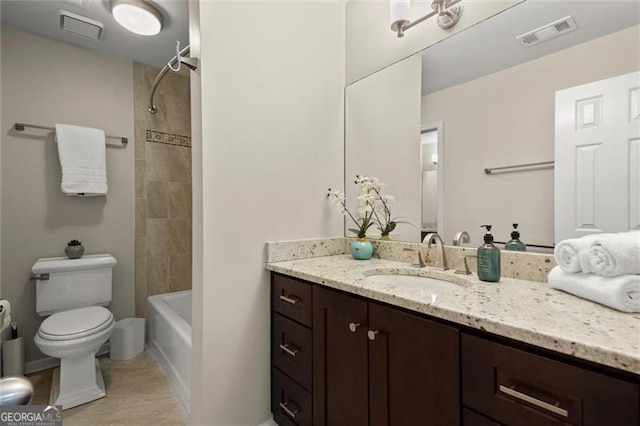 bathroom featuring toilet, shower / washtub combination, vanity, and visible vents