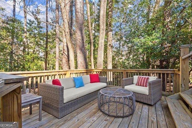 deck featuring outdoor lounge area