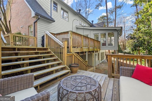 deck featuring stairway