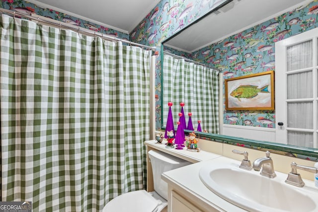 bathroom with crown molding, curtained shower, toilet, vanity, and wallpapered walls