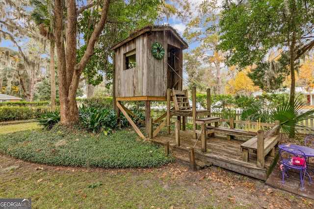 view of play area with an outbuilding