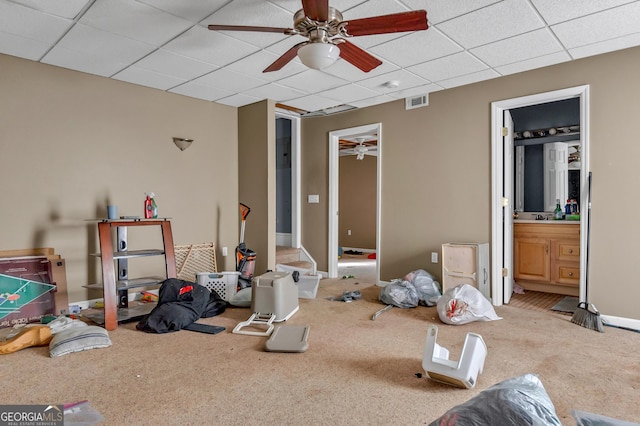 111 Laurel Oak Ln, Warner Robins, GA 31093 - carpeted bedroom with ensuite bathroom, a drop ceiling, visible vents, and baseboards
