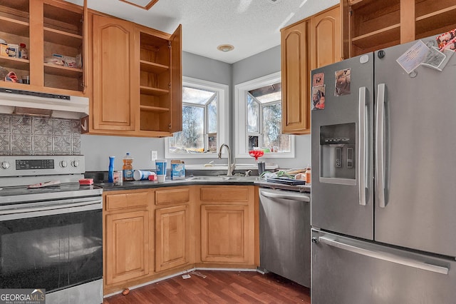 111 Laurel Oak Ln, Warner Robins, GA 31093 - kitchen featuring dark wood-style floors, stainless steel appliances, under cabinet range hood, open shelves, and a sink