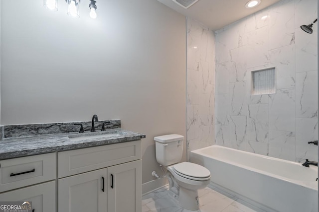 full bath with baseboards, bathing tub / shower combination, toilet, marble finish floor, and vanity