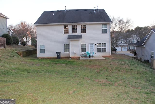 back of house featuring a patio, fence, and a lawn