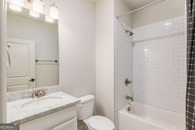 full bathroom with shower / bathing tub combination, vanity, and toilet