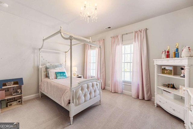 bedroom featuring a chandelier, carpet, visible vents, and baseboards