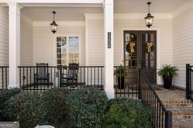 entrance to property with a porch