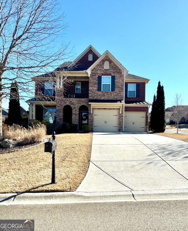 view of front of house with driveway, brick siding, and an attached garage