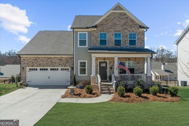 craftsman house featuring a garage, covered porch, driveway, and brick siding