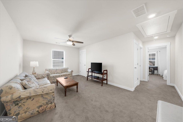 2401 Cotton Gin Row, Jefferson, GA 30549 - carpeted living room featuring ceiling fan, visible vents, baseboards, and attic access