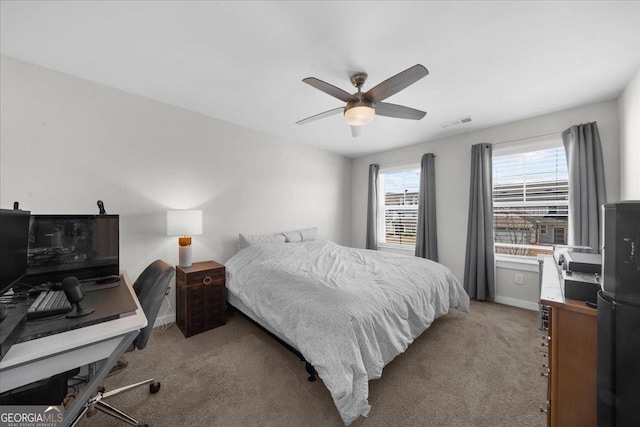 2401 Cotton Gin Row, Jefferson, GA 30549 - carpeted bedroom featuring baseboards, a ceiling fan, and visible vents