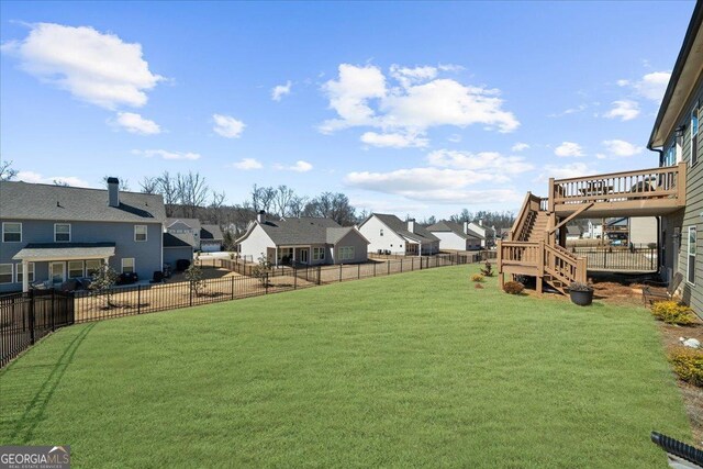 2401 Cotton Gin Row, Jefferson, GA 30549 - view of yard featuring fence, a residential view, stairs, and a wooden deck