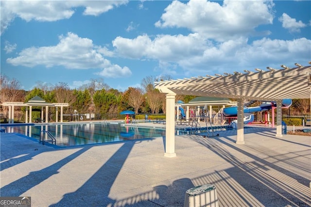2401 Cotton Gin Row, Jefferson, GA 30549 - community pool featuring a pergola, a water slide, and a patio
