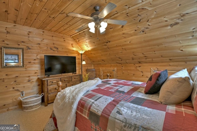 bedroom with carpet floors, wood walls, wood ceiling, and vaulted ceiling