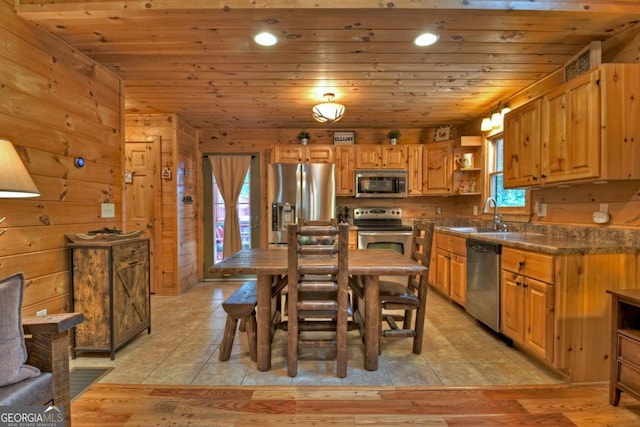 kitchen with dark countertops, wooden ceiling, stainless steel appliances, open shelves, and a sink