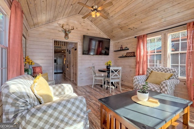 664 River Vista Dr, Dillard, GA 30537 - living area featuring wooden walls, wood finished floors, lofted ceiling, ceiling fan, and wooden ceiling