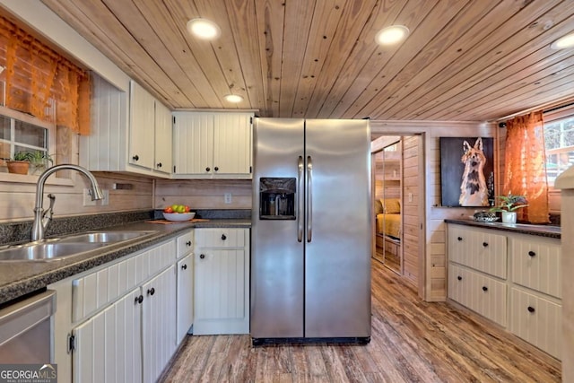 664 River Vista Dr, Dillard, GA 30537 - kitchen with appliances with stainless steel finishes, wood ceiling, light wood finished floors, dark countertops, and recessed lighting