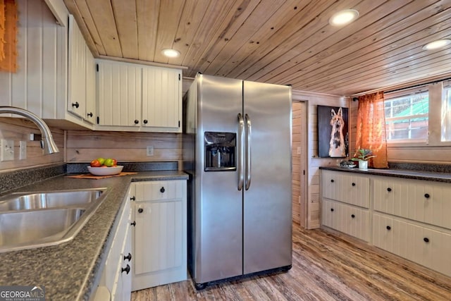 664 River Vista Dr, Dillard, GA 30537 - kitchen featuring stainless steel refrigerator with ice dispenser, wooden ceiling, dark countertops, light wood-style flooring, and recessed lighting