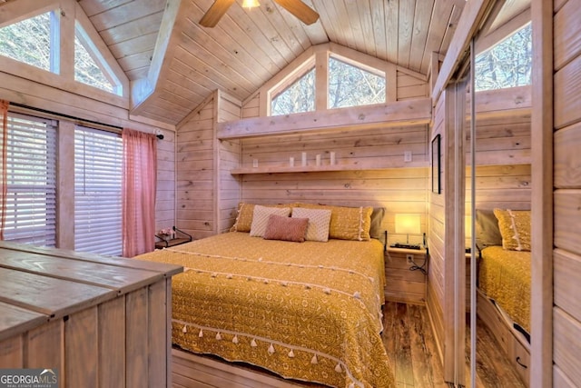 664 River Vista Dr, Dillard, GA 30537 - bedroom with vaulted ceiling, wood walls, and wood finished floors