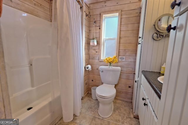 664 River Vista Dr, Dillard, GA 30537 - bathroom with vanity, wood walls, and tile patterned floors