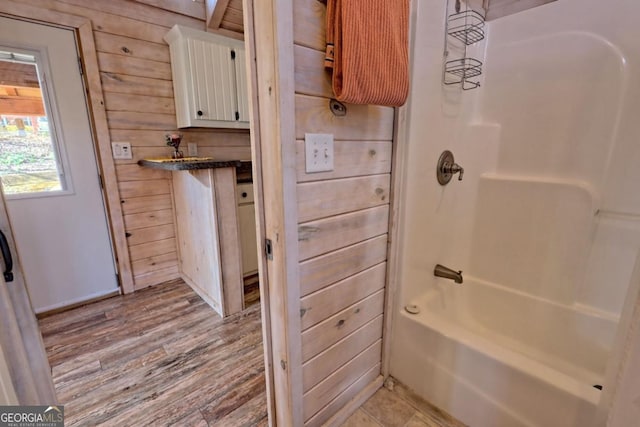 664 River Vista Dr, Dillard, GA 30537 - bathroom with wood finished floors, shower / tub combination, and vanity