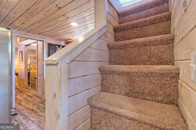 664 River Vista Dr, Dillard, GA 30537 - stairs featuring wooden ceiling and wood finished floors