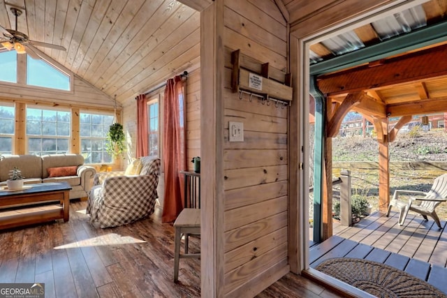 664 River Vista Dr, Dillard, GA 30537 - sunroom with vaulted ceiling, wooden walls, wooden ceiling, wood-type flooring, and a deck