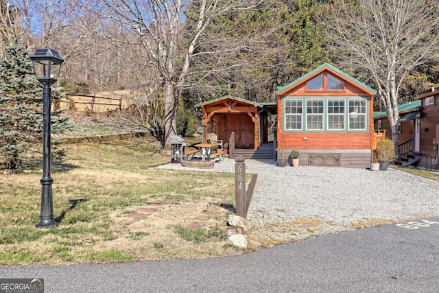 664 River Vista Dr, Dillard, GA 30537 - view of front of property with a front yard and entry steps