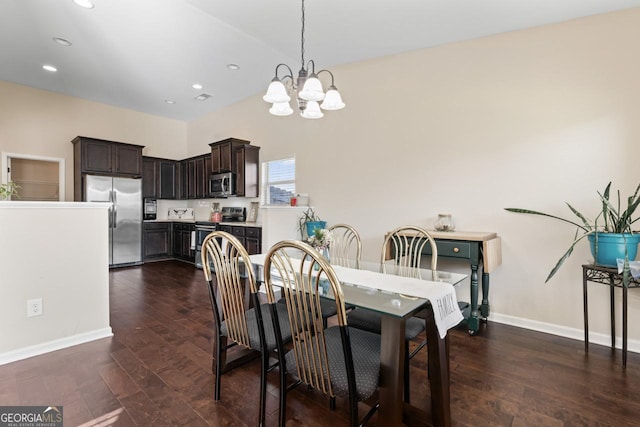 dining area with dark wood-style floors, recessed lighting, an inviting chandelier, and baseboards