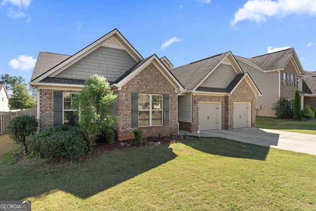 craftsman house featuring driveway, brick siding, fence, and a front yard