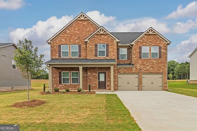 craftsman house featuring concrete driveway, brick siding, an attached garage, and a front lawn