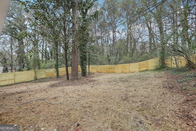 view of yard with fence